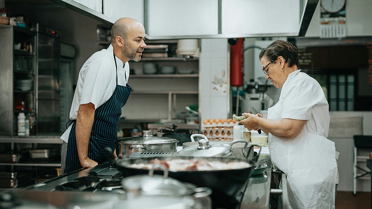Chefs preparing food in a restaurant