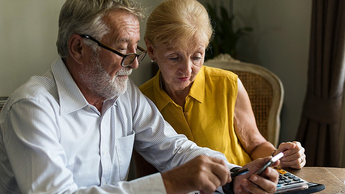 Older couple planning their retirement together