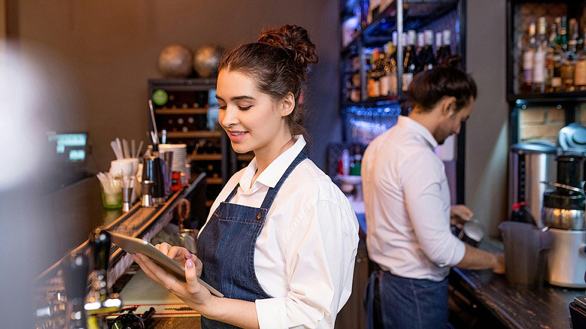 Bar staff taking customer orders